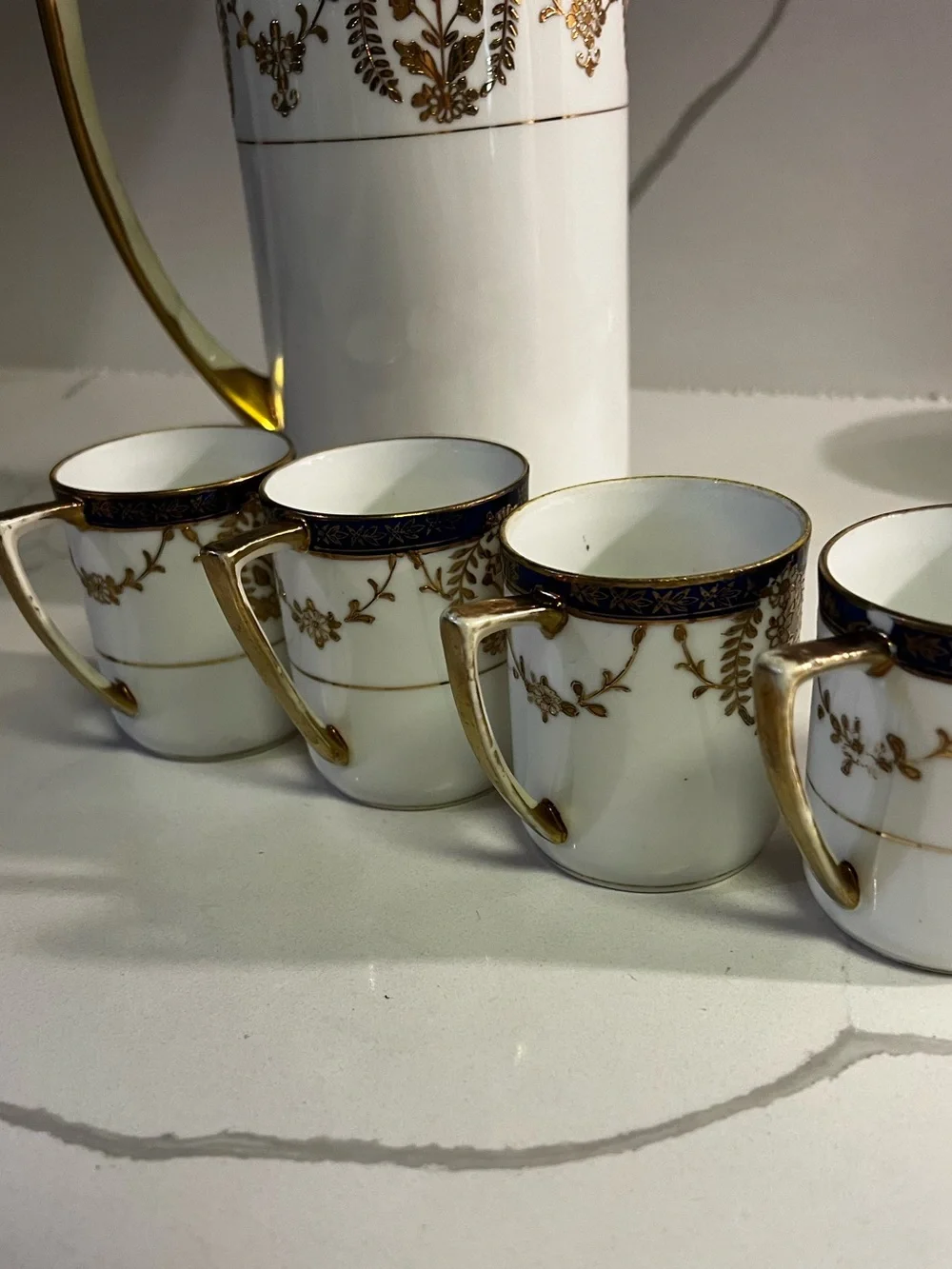 Elegant White Porcelain Coffee/Tea Set with Dark Blue and Gold Trim